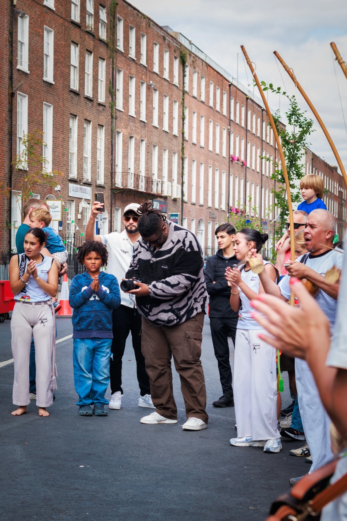 Filming a street capoeira performance in Limerick